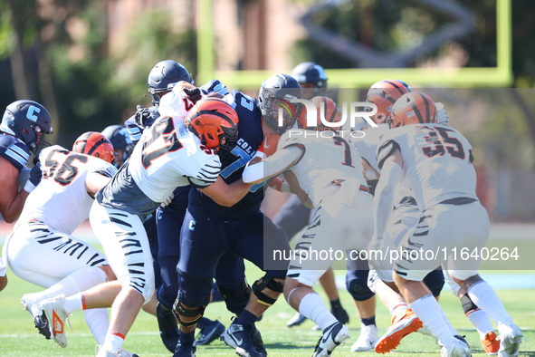 Columbia Lions offensive lineman Pat Colicchio #73 takes on multiple defenders during the NCAA football game against the Princeton Tigers at...