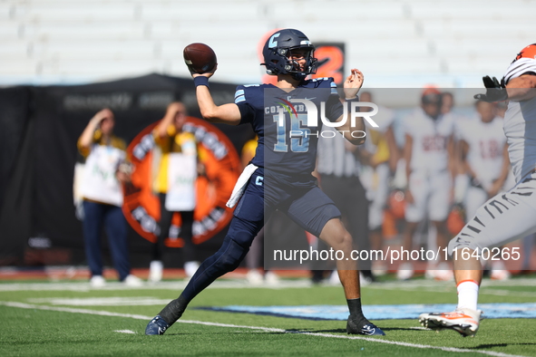 Columbia Lions quarterback Chase Goodwin #15 steps back to throw during the NCAA football game against the Princeton Tigers at Robert K. Kra...