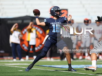 Columbia Lions quarterback Chase Goodwin #15 steps back to throw during the NCAA football game against the Princeton Tigers at Robert K. Kra...