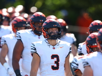 Princeton Tigers players come out on the field before the start of the NCAA football game against the Columbia Lions at Robert K. Kraft Fiel...