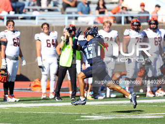 Columbia Lions wide receiver Edan Stagg #13 searches for the ball during the NCAA football game against the Princeton Tigers at Robert K. Kr...