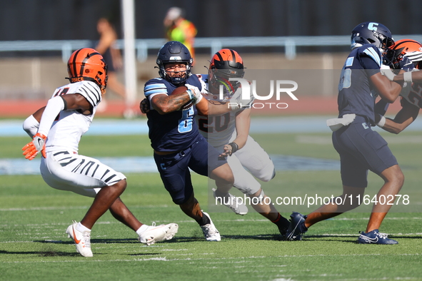 Columbia Lions running back Malcolm Terry II #6 breaks away from the defense during the NCAA football game against the Princeton Tigers at R...