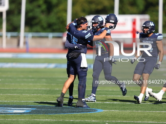 Columbia Lions quarterback Chase Goodwin #15 celebrates with teammates as time expires during the NCAA football game against the Princeton T...