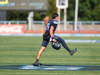 Columbia Lions quarterback Chase Goodwin #15 celebrates with teammates as time expires during the NCAA football game against the Princeton T...