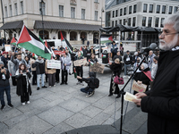 People take part in a protest in support of Palestine, in Warsaw, Poland, on October 5, 2024. Protesters march from the city center to the U...