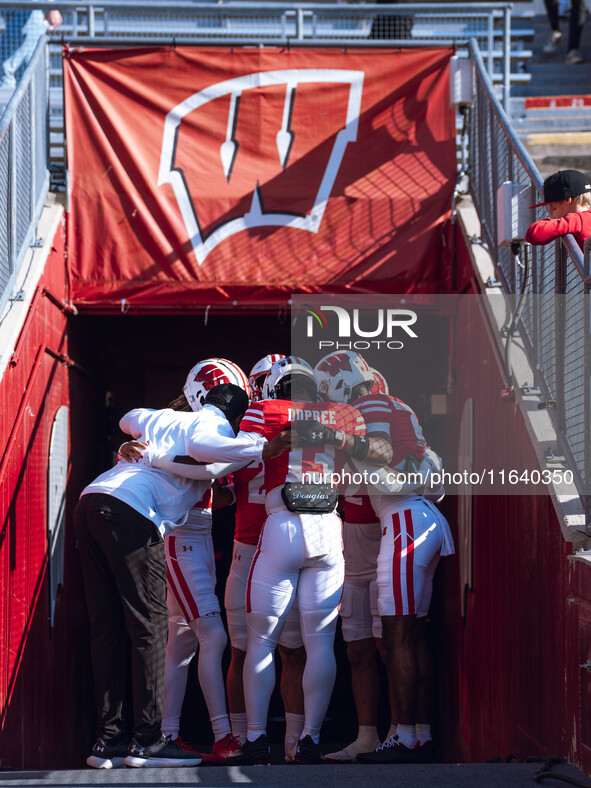 The Wisconsin Badgers prepare outside the tunnel against the Purdue Boilermakers at Camp Randall Stadium in Madison, Wisconsin, on October 5...