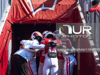 The Wisconsin Badgers prepare outside the tunnel against the Purdue Boilermakers at Camp Randall Stadium in Madison, Wisconsin, on October 5...