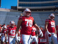 Wisconsin Badgers offensive lineman Barrett Nelson #70 walks out of the tunnel against the Purdue Boilermakers at Camp Randall Stadium in Ma...