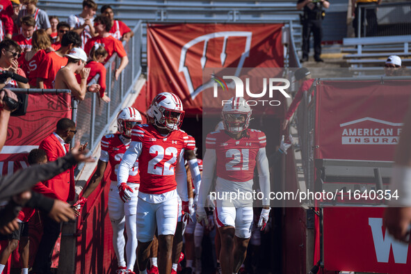 The Wisconsin Badgers walk out of the tunnel against the Purdue Boilermakers at Camp Randall Stadium in Madison, Wisconsin, on October 5, 20...