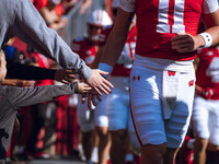 The Wisconsin Badgers walk out of the tunnel against the Purdue Boilermakers at Camp Randall Stadium in Madison, Wisconsin, on October 5, 20...