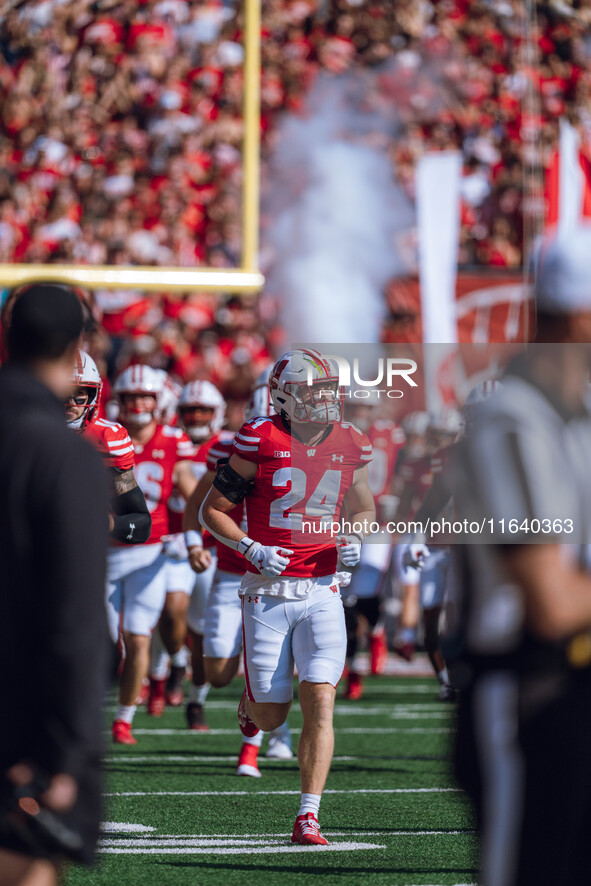 Wisconsin Badgers safety Hunter Wohler #24 takes the field before the Wisconsin Badgers face the Purdue Boilermakers at Camp Randall Stadium...