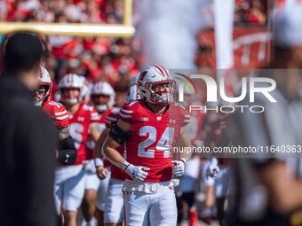 Wisconsin Badgers safety Hunter Wohler #24 takes the field before the Wisconsin Badgers face the Purdue Boilermakers at Camp Randall Stadium...