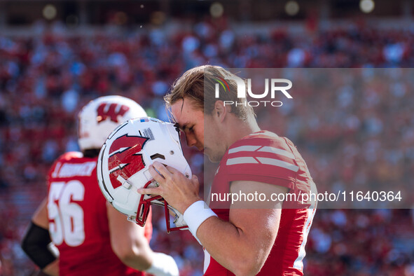 Wisconsin Badgers quarterback Mabrey Mettauer #11 prepares against the Purdue Boilermakers at Camp Randall Stadium in Madison, Wisconsin, on...