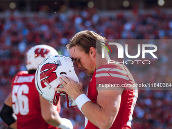 Wisconsin Badgers quarterback Mabrey Mettauer #11 prepares against the Purdue Boilermakers at Camp Randall Stadium in Madison, Wisconsin, on...