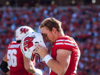 Wisconsin Badgers quarterback Mabrey Mettauer #11 prepares against the Purdue Boilermakers at Camp Randall Stadium in Madison, Wisconsin, on...