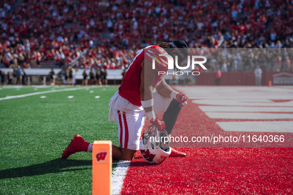 Wisconsin Badgers tight end Riley Nowakowski #37 takes a knee in the south end zone at Camp Randall Stadium in Madison, Wisconsin, on Octobe...