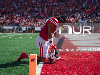 Wisconsin Badgers tight end Riley Nowakowski #37 takes a knee in the south end zone at Camp Randall Stadium in Madison, Wisconsin, on Octobe...