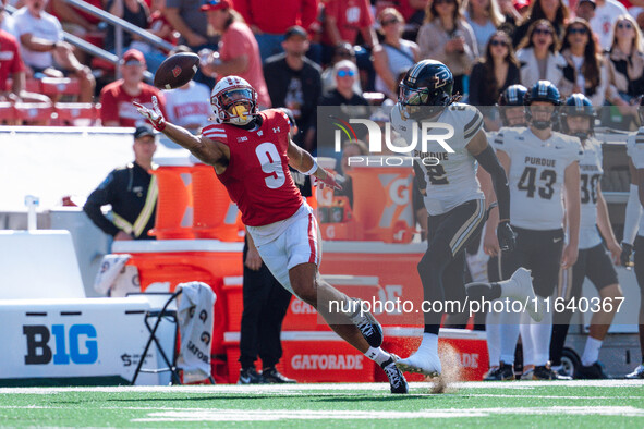 Wisconsin Badgers wide receiver Bryson Green #9 attempts to catch a pass just out of his reach against the Purdue Boilermakers at Camp Randa...