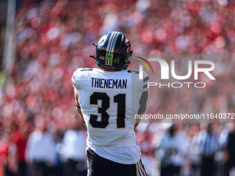 Purdue defensive back Dillon Thieneman #31 fumbles a second punt against the Wisconsin Badgers at Camp Randall Stadium in Madison, Wisconsin...