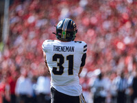 Purdue defensive back Dillon Thieneman #31 fumbles a second punt against the Wisconsin Badgers at Camp Randall Stadium in Madison, Wisconsin...