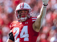 Wisconsin Badgers safety Hunter Wohler #24 celebrates a fumble recovery on special teams against the Purdue Boilermakers at Camp Randall Sta...