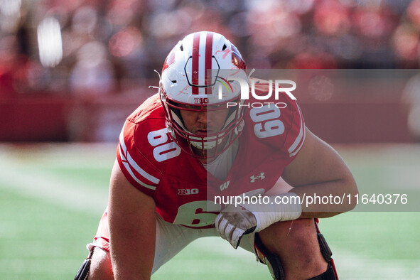 Wisconsin Badgers offensive lineman Joe Huber #60 lines up against the Purdue Boilermakers on the goal line at Camp Randall Stadium in Madis...