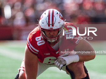 Wisconsin Badgers offensive lineman Joe Huber #60 lines up against the Purdue Boilermakers on the goal line at Camp Randall Stadium in Madis...