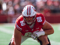 Wisconsin Badgers offensive lineman Joe Huber #60 lines up against the Purdue Boilermakers on the goal line at Camp Randall Stadium in Madis...