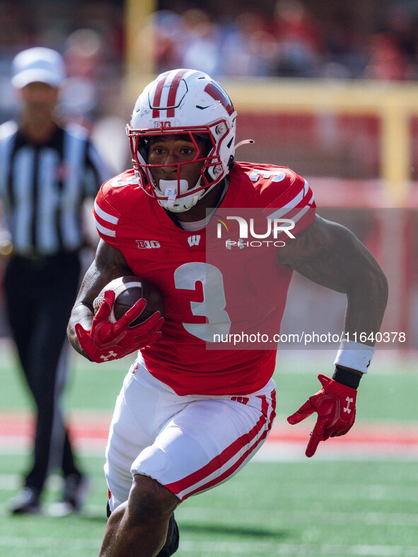 Wisconsin Badgers running back Tawee Walker #3 runs in a touchdown against the Purdue Boilermakers at Camp Randall Stadium in Madison, Wisco...