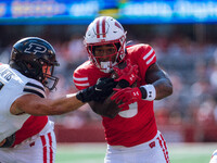 Wisconsin Badgers running back Tawee Walker #3 runs in a touchdown against the Purdue Boilermakers at Camp Randall Stadium in Madison, Wisco...