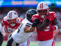 Wisconsin Badgers running back Tawee Walker #3 runs in a touchdown against the Purdue Boilermakers at Camp Randall Stadium in Madison, Wisco...