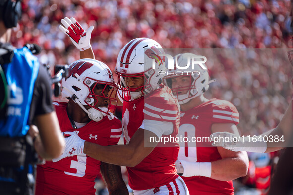 Wisconsin Badgers wide receiver C.J. Williams #4 celebrates a Tawee Walker #3 touchdown against the Purdue Boilermakers at Camp Randall Stad...