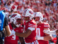 Wisconsin Badgers wide receiver C.J. Williams #4 celebrates a Tawee Walker #3 touchdown against the Purdue Boilermakers at Camp Randall Stad...