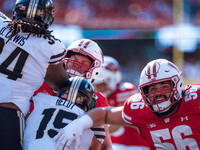 Wisconsin Badgers offensive lineman Joe Brunner #56 braces for an extra point against the Purdue Boilermakers at Camp Randall Stadium in Mad...