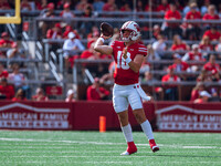 Wisconsin Badgers quarterback Braedyn Locke #18 throws a pass against the Purdue Boilermakers at Camp Randall Stadium in Madison, Wisconsin,...