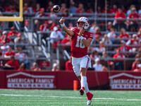 Wisconsin Badgers quarterback Braedyn Locke #18 throws a pass against the Purdue Boilermakers at Camp Randall Stadium in Madison, Wisconsin,...