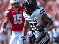 Purdue running back Reggie Love III #23 runs the ball against the Wisconsin Badgers at Camp Randall Stadium in Madison, Wisconsin, on Octobe...