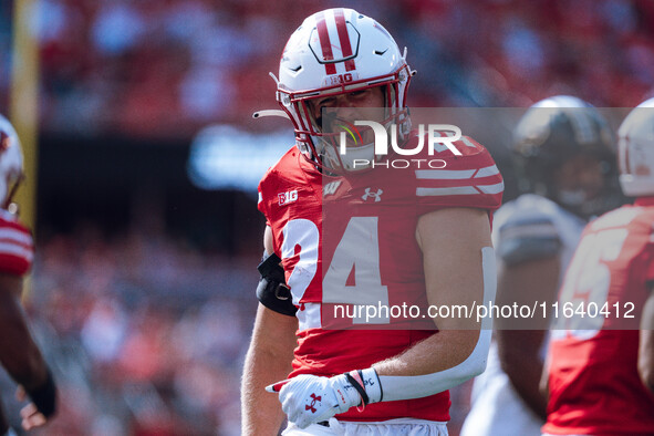 Wisconsin Badgers safety Hunter Wohler #24 celebrates a hard hit against the Purdue Boilermakers at Camp Randall Stadium in Madison, Wiscons...