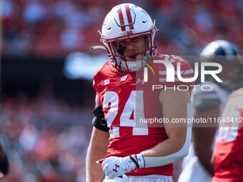 Wisconsin Badgers safety Hunter Wohler #24 celebrates a hard hit against the Purdue Boilermakers at Camp Randall Stadium in Madison, Wiscons...