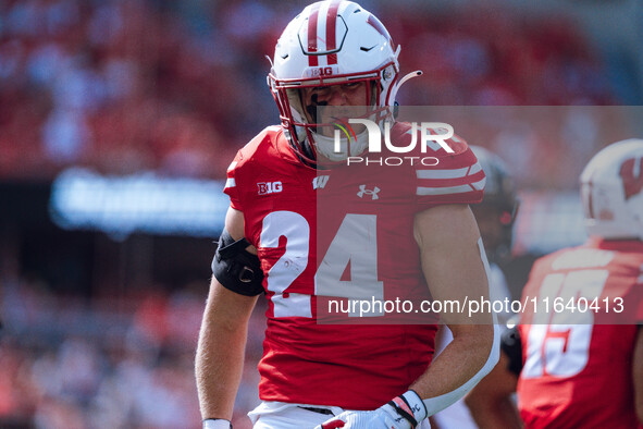 Wisconsin Badgers safety Hunter Wohler #24 celebrates a hard hit against the Purdue Boilermakers at Camp Randall Stadium in Madison, Wiscons...