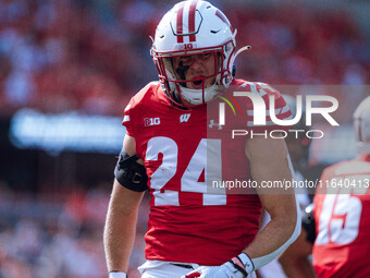 Wisconsin Badgers safety Hunter Wohler #24 celebrates a hard hit against the Purdue Boilermakers at Camp Randall Stadium in Madison, Wiscons...