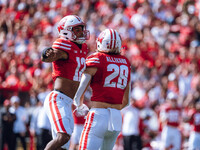 Wisconsin Badgers linebacker Christian Alliegro #28 and cornerback Max Lofy #12 celebrate a defensive stop against the Purdue Boilermakers a...