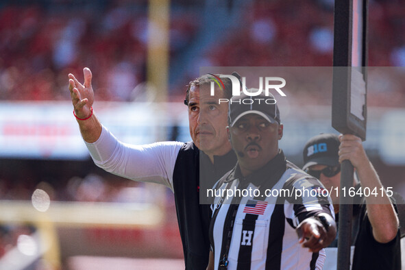 Wisconsin Badgers Head Coach Luke Fickell pleads his case against the Purdue Boilermakers at Camp Randall Stadium in Madison, Wisconsin, on...