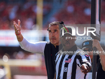 Wisconsin Badgers Head Coach Luke Fickell pleads his case against the Purdue Boilermakers at Camp Randall Stadium in Madison, Wisconsin, on...