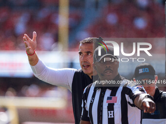 Wisconsin Badgers Head Coach Luke Fickell pleads his case against the Purdue Boilermakers at Camp Randall Stadium in Madison, Wisconsin, on...