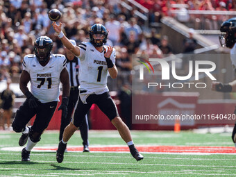 Purdue Boilermakers quarterback Hudson Card #1 throws a pass against the Wisconsin Badgers at Camp Randall Stadium in Madison, Wisconsin, on...