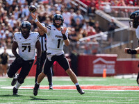 Purdue Boilermakers quarterback Hudson Card #1 throws a pass against the Wisconsin Badgers at Camp Randall Stadium in Madison, Wisconsin, on...