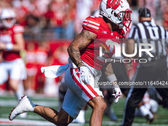 Wisconsin Badgers wide receiver Trech Kekahuna #2 runs across the field against the Purdue Boilermakers at Camp Randall Stadium in Madison,...