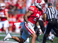 Wisconsin Badgers wide receiver Trech Kekahuna #2 runs across the field against the Purdue Boilermakers at Camp Randall Stadium in Madison,...