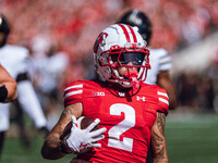 Wisconsin Badgers wide receiver Trech Kekahuna #2 outruns the Purdue Boilermakers defense for a touchdown at Camp Randall Stadium in Madison...